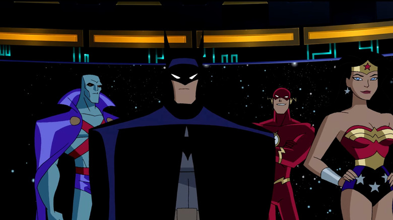 Martian Manhunter, Batman, Flash and Wonder Woman standing together in Justice League animated series