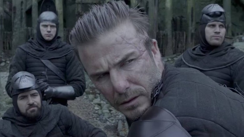Trigger (David Beckham) looking over his shoulder in King Arthur: Legend of the Sword