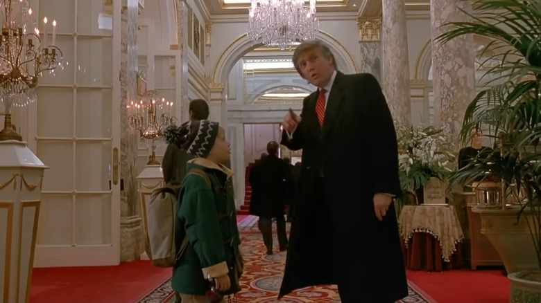 Donald Trump pointing Kevin (Macauley Culkin) toward the lobby in Home Alone 2: Lost in New York