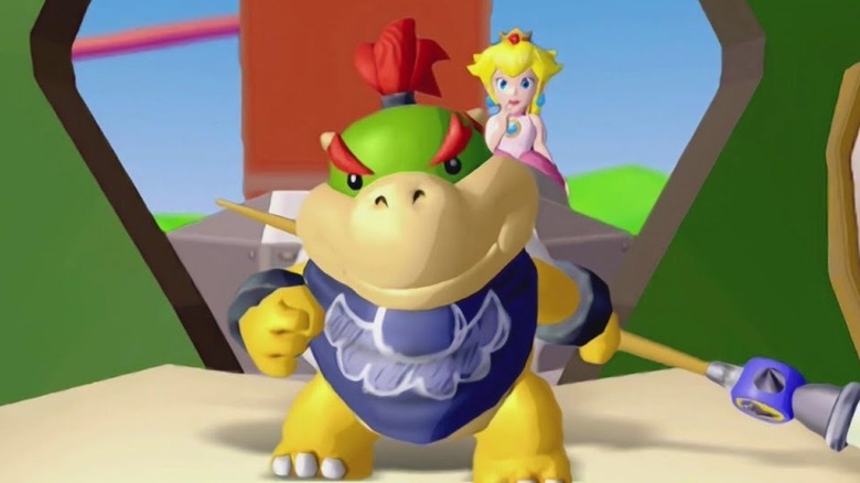 Bowser Jr. wearing a Shadow Mario bandana and holding a paintbrush while standing in front of Peach in Super Mario Sunshine