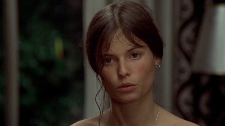 A medium shot of Kay Lenz as Breezy, looking at someone past the frame.