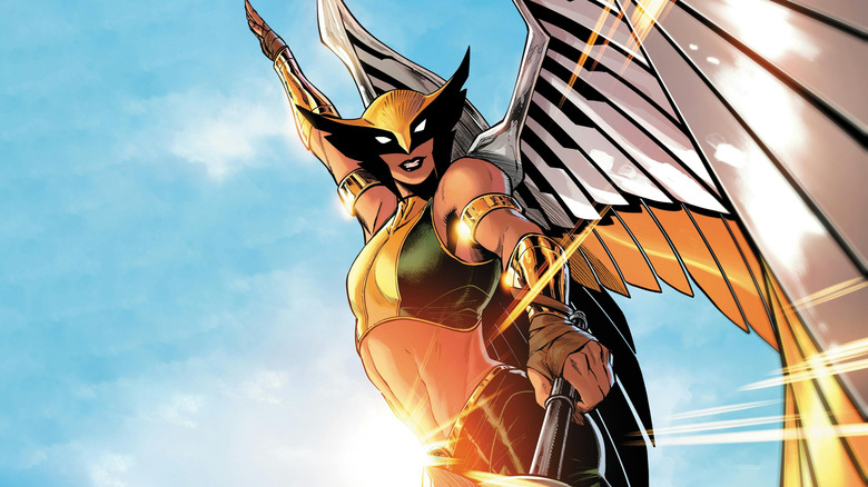 Hawkgirl looks down as she soars into the sky in DC Comics