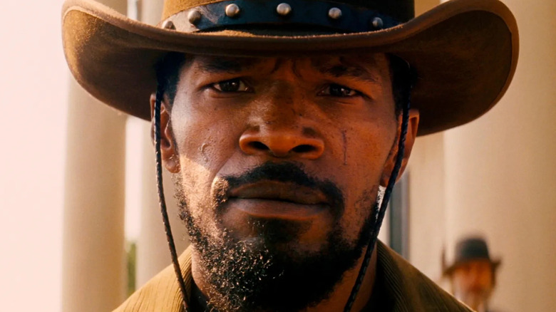Django (Jamie Foxx) stares ahead stoically in Django Unchained