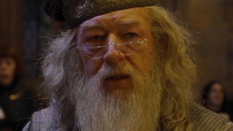 A close-up of Michael Gambon as Albus Dumbledore in Harry Potter and the Goblet of Fire, looking over his spectacles.
