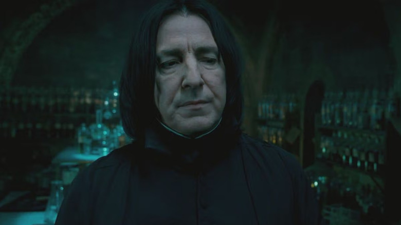 Alan Rickman as Severus Snape in Harry Potter and the Order of the Phoenix, standing among his stash of potions.