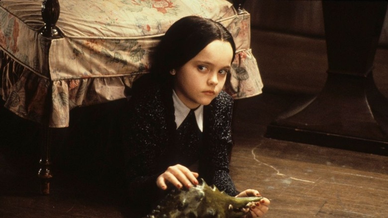 Christina Ricci as Wednesday Addams.