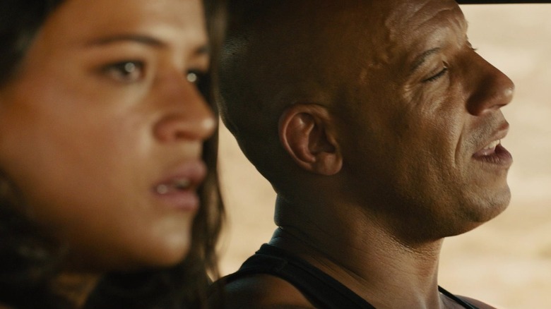 Dom (Vin Diesel) talks to Letty (Michelle Rodriguez) in Furious 7