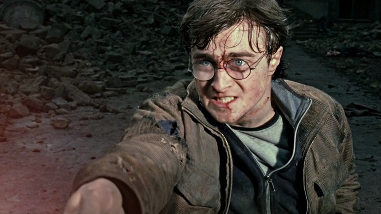 Harry Potter (Daniel Radcliffe) uses a wand in Harry Potter and the Deathly Hallows Part II