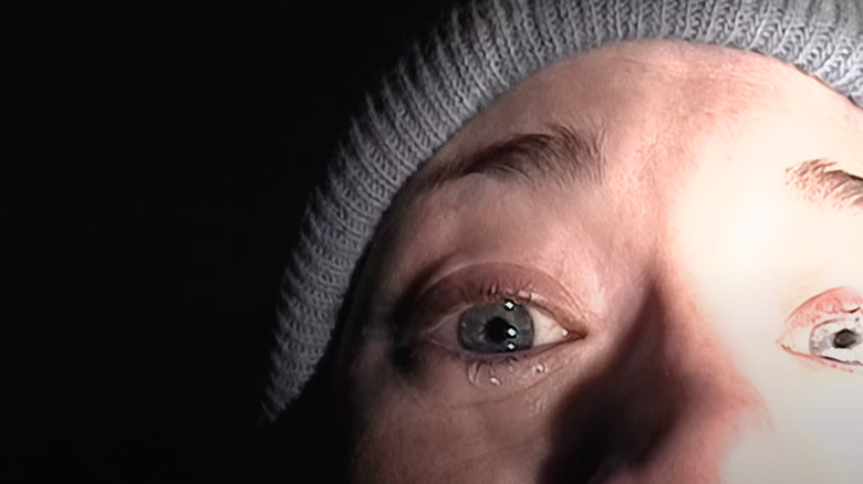 Heather Donahue as Heather cries into the camera in The Blair Witch Project