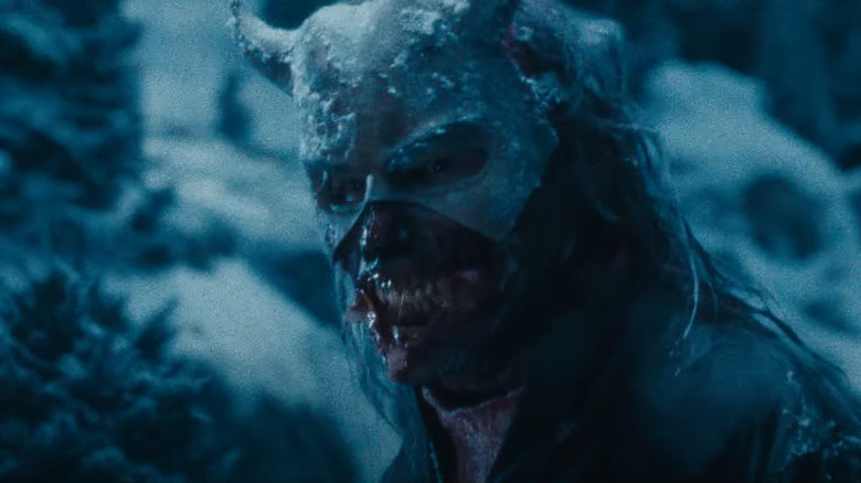 The Grabber grins with his bloody mouth in Black Phone 2