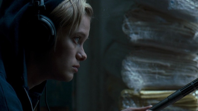 Sara Paxton with headphones and mic