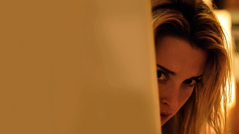 Em (Emily Foxler) attends a disastrous dinner party in Coherence
