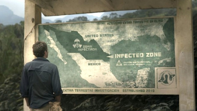 Andrew (Scoot McNairy) looks at a map in Monsters