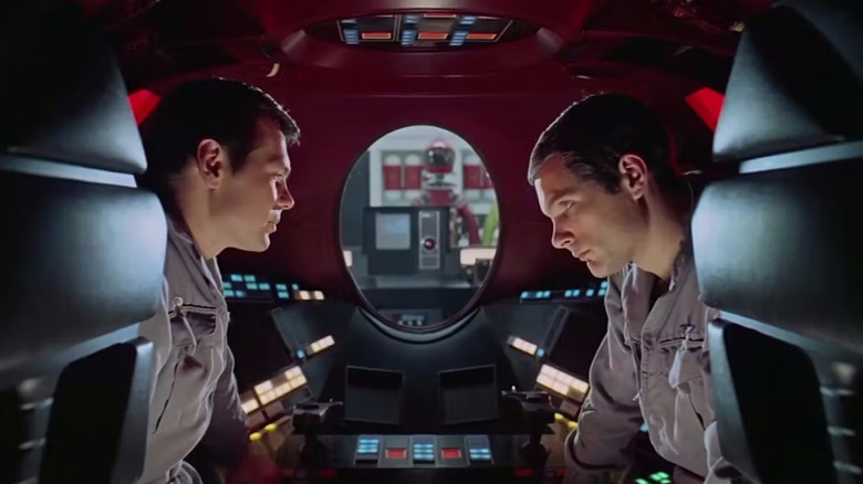 Gary Lockwood as Dr. Frank Poole talks to Keir Dullea as Dr. David Bowman as HAL 9000 watches in 2001: A Space Odyssey