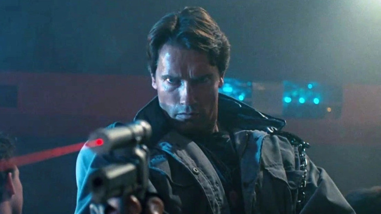 Arnold Schwarzenegger as the T-800 takes aim in The Terminator