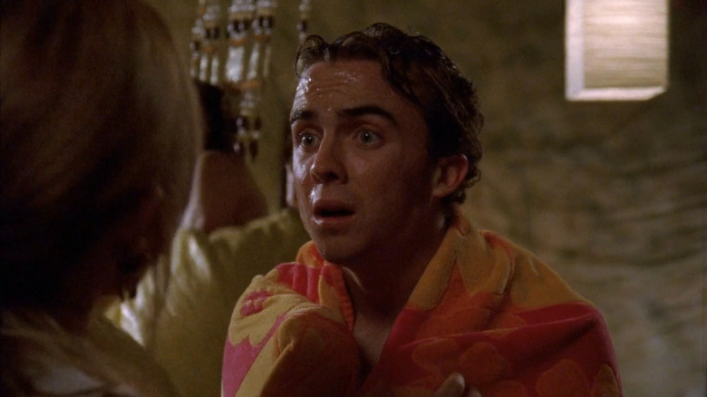 Malcolm (Frankie Muniz) wrapping in a towel on Malcolm in the Middle