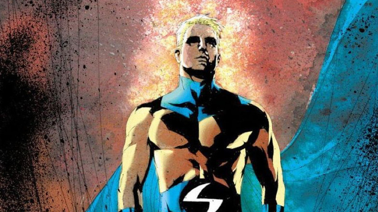 The Sentry glows gold with a blue cape flowing