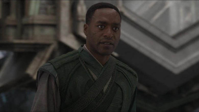 Chewitel Ejiofo as Baron Mordo looking scared in the mirror dimension in Doctor Strange