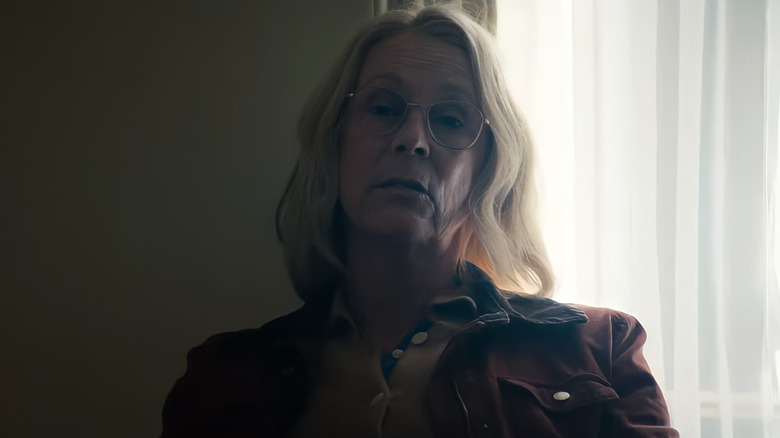 Jaime Lee Curtis leaning chair Halloween Ends
