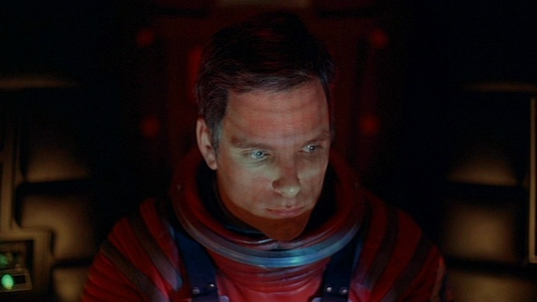 Dr. David Bowman (Keir Dullea) with face illuminated in 2001: A Space Odyssey