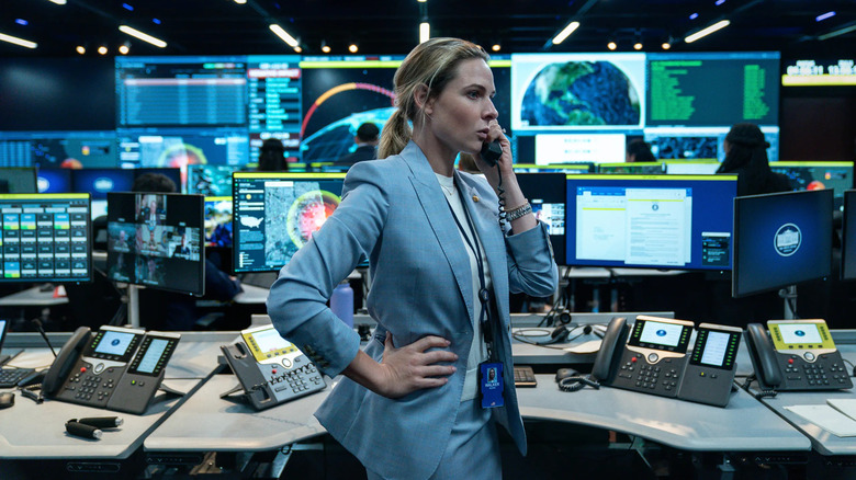 Rebecca Ferguson as Captain Olivia Walker, taking a call in a command center in House of Dynamite
