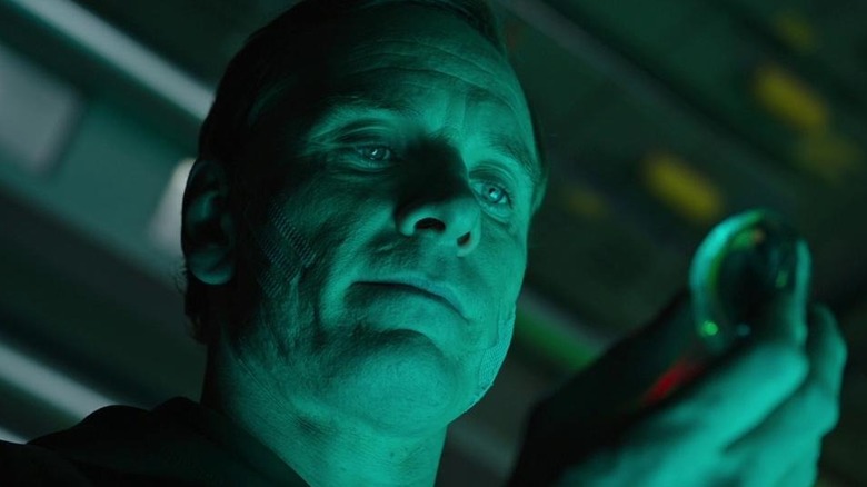 David (Michael Fassbender) holding an egg in Alien: Covenant