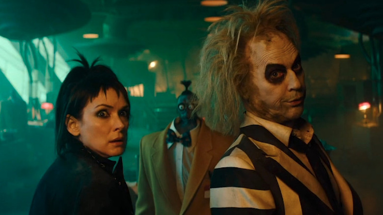 Betelgeuse (Michael Keaton) and Lydia (Winona Ryder) in an afterlife office in Beetlejuice Beetlejuice
