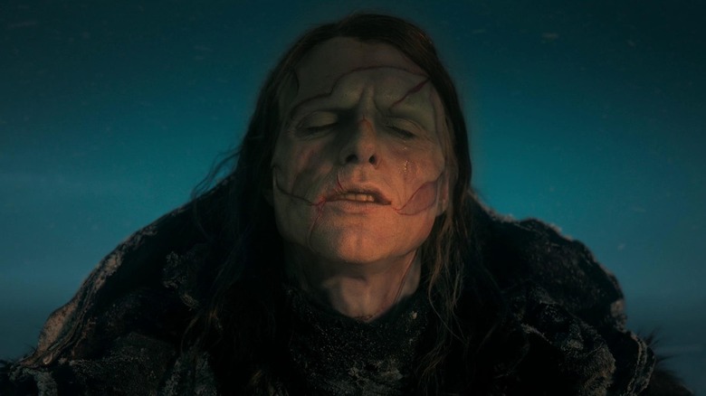 Frankenstein's monster (Jacob Elordi) basking in sunlight in Frankenstein