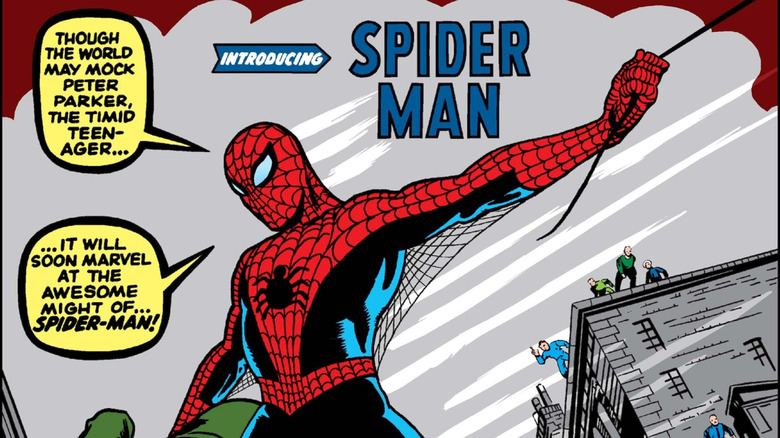 Spider-Man swinging and holding a thug on the cover of Amazing Fantasy #15