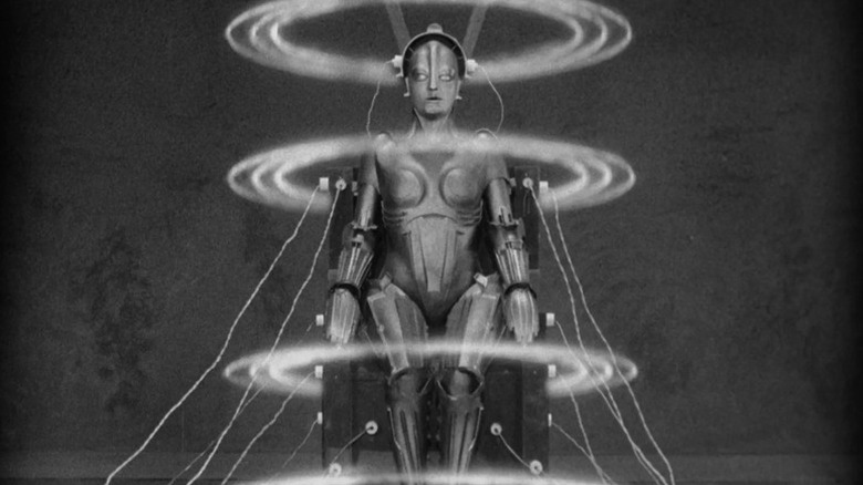 The robotic Maria (Brigitte Helm) is powered by rings of energy in Metropolis (1927)