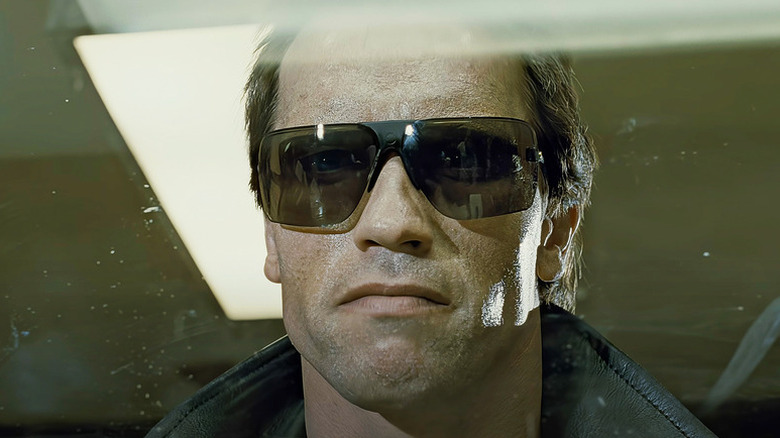 The T-800 (Arnold Schwarzenegger) stares impassively through his sunglasses in The Terminator
