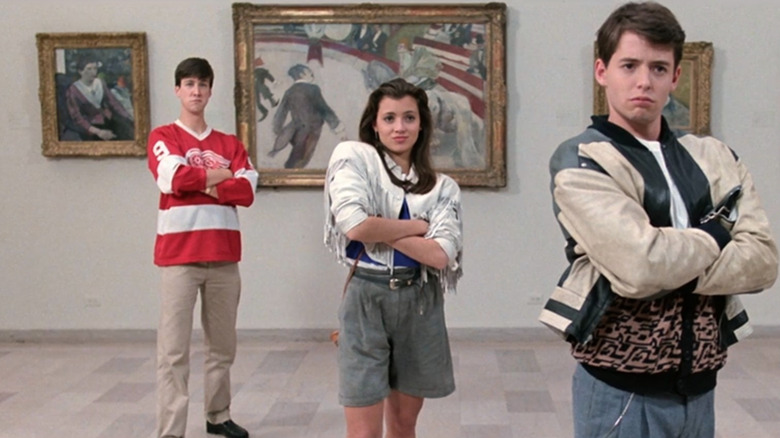 Cameron (Alan Ruck), Sloane (Mia Sara), and Ferris (Matthew Broderick) crossing their arms in a museum in Ferris Bueller's Day Off