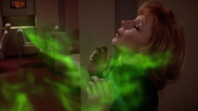 Beverly Crusher (Gates McFadden) reacts sensually to green smoke in Star Trek: The Next Generation