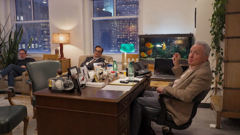 Lorne Michaels looks up from sitting at his desk in Lorne