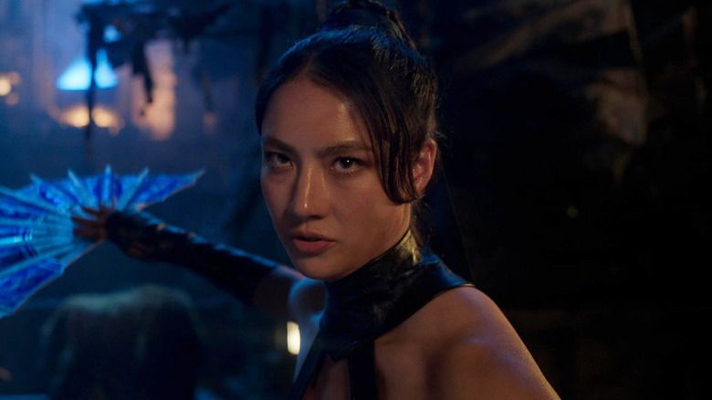 Kitana (Adeline Rudolph) brandishes a bladed fan in Mortal Kombat II