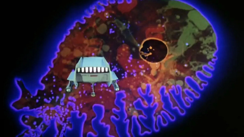 A shuttle cruises towards the colorful nucleus of an amoeba in Star Trek: The Original Series