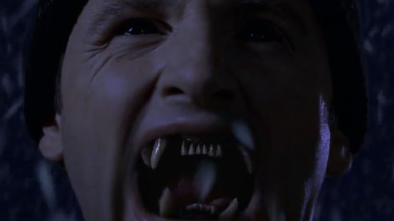 Colm Feore as André Linoge showing his fangs in Storm of the Century