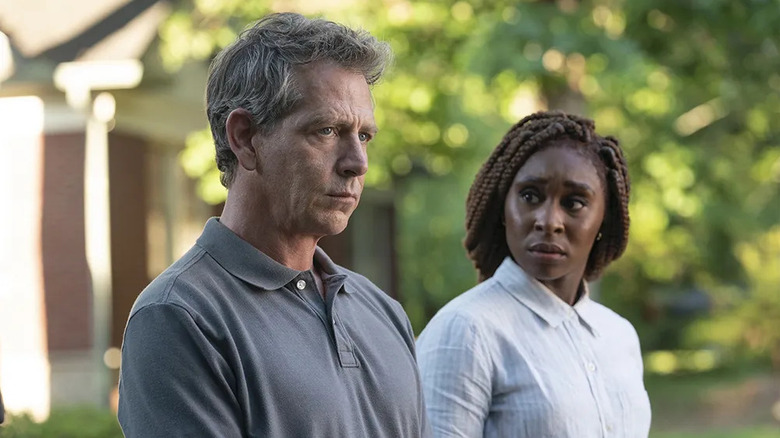Holly Gibney (Cynthia Erivo) stares at Ralph Anderson (Ben Mendelsohn) in The Outsider