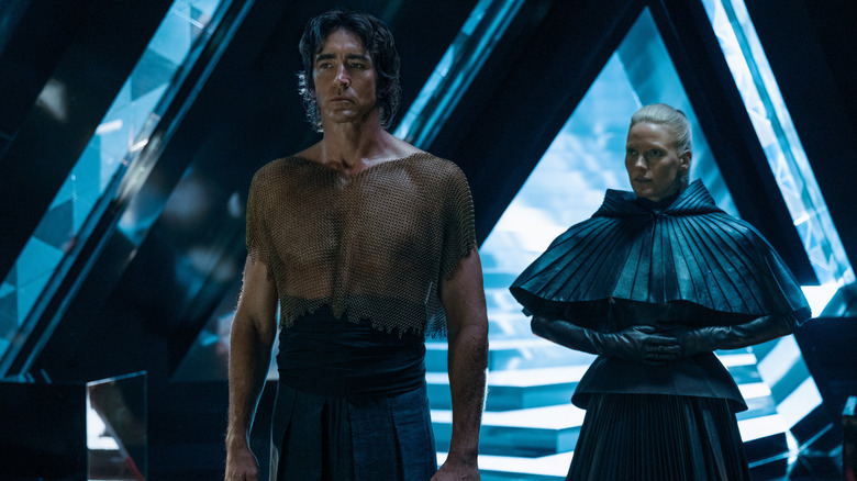Brother Day (Lee Pace) stands in front of Demerzel (Laura Birn) in Foundation