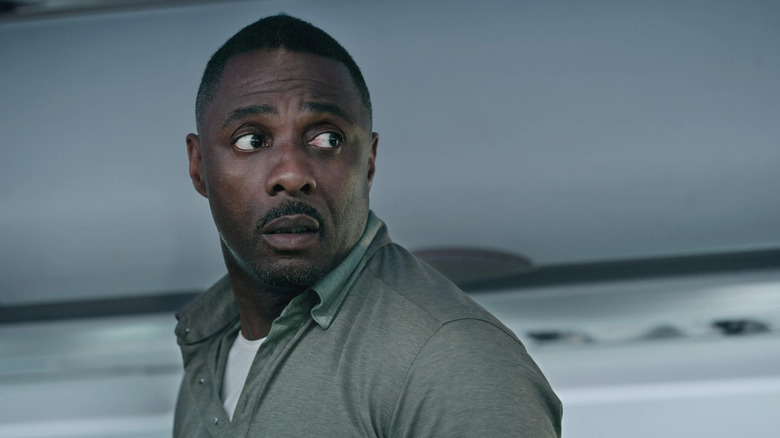 Sam Nelson (Idris Elba) looks back concerned in Hijack