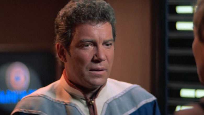 Captain Kirk (William Shatner) lost in thought in Star Trek III: The Search for Spock