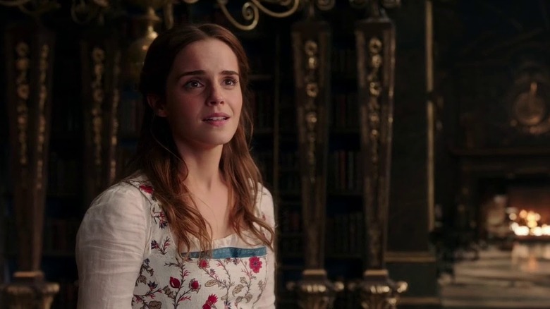 Belle (Emma Watson) looking at the library in Beauty and the Beast