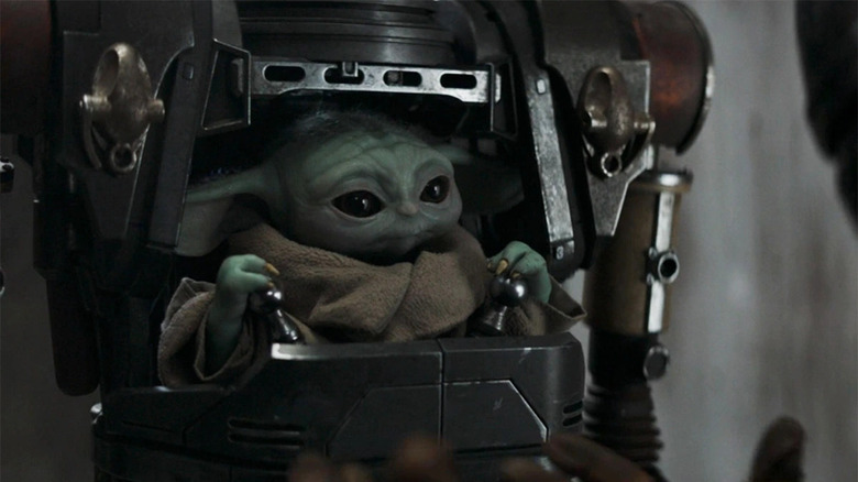 Grogu riding in IG-12