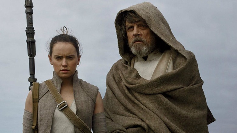 Rey and Luke Skywalker standing together