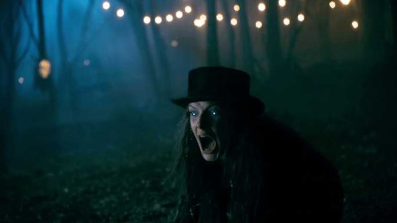Rose the Hat (Rebecca Ferguson) screams in inhuman fury, her eyes glowing, in Doctor Sleep.