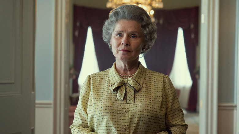 Imelda Staunton yellow dress pearls