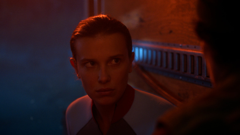 Eleven (Millie Bobby Brown) in the back of the truck on Stranger Things