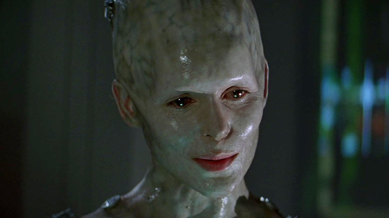 The Borg Queen (Alice Krige) glances down at a restrained Data (Brent Spiner) in Star Trek: First Contact