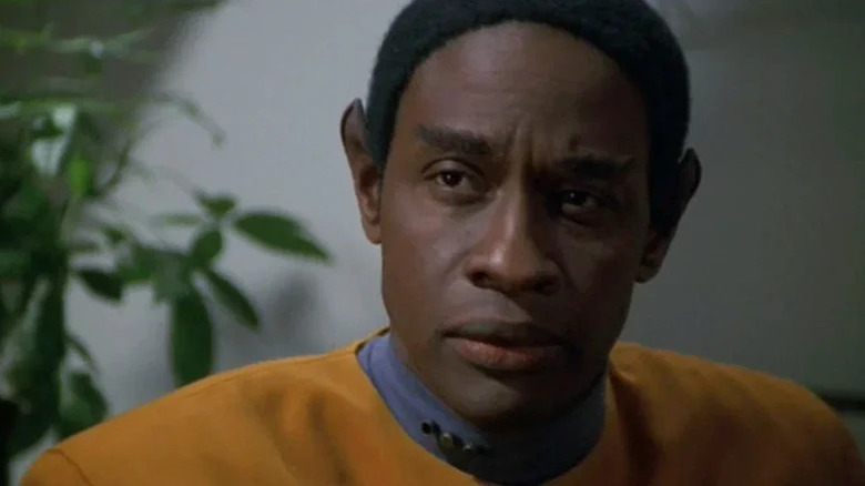 Tuvok (Tim Russ) sits inquisitively in Star Trek: Voyager