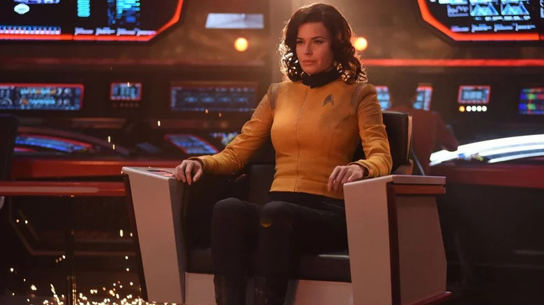 Una Chin-Riley (Rebecca Romijn) sits in the captain's chair in Star Trek: Discovery